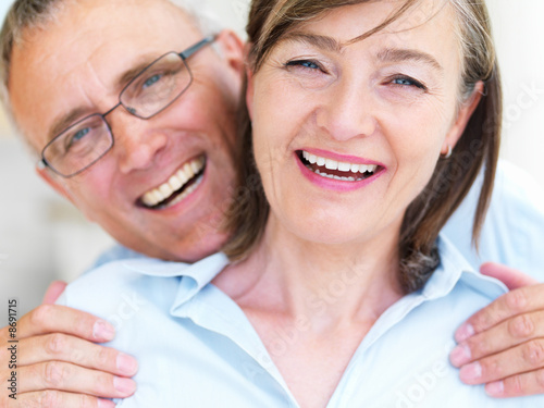 Portrait of romantic old couple having fun