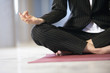 View of a woman meditating.