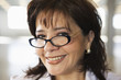 Photo: Portrait of a woman smiling. Portrait of a woman smiling.