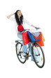happy young lady on bike returning from shopping