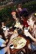 Teenagers hanging out;eating