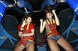 Two female teenagers on amusement park ride