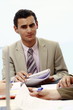 Closeup of businessman at meeting