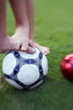Photo: Two children's feet with balls Two children's feet with balls