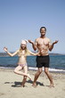 Father and daughter on beach