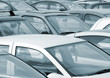 Telephoto view of cars parked in parking lot