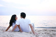 Photo: Couple Facing Toward the Water on their Honeymoon Couple Facing Toward the Water on their Honeymoon