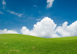 Rolling green hills under a blue summer sky. Rolling green hills under a blue summer sky.