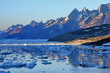 Photo: Icebergs in the evening with the streak of light on coast Icebergs in the evening with the streak of light on coast