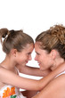 mother and daughter embracing with foreheads touching mother and daughter embracing with foreheads touching