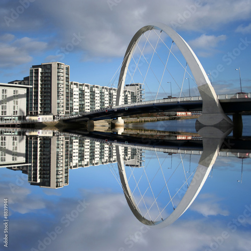 new bridge reflected in river Clyde Glasgow Scotland