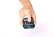 Women hand, click on button, turn on, tv