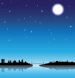 Istanbul silhouette at night with reflection on the sea