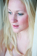 An attractive woman looking away from the camera
