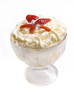 minty whipped cream with fruits decorated by strawberry