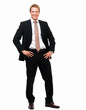 Smiling Businessman standing against isolated white background