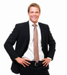Smiling Businessman standing against isolated white background