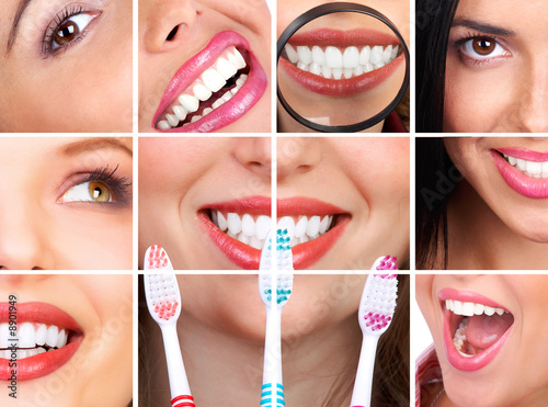 Photo: Smiling young woman with healthy teeth holding a tooth-brush. Smiling young woman with healthy teeth holding a tooth-brush.