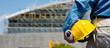 A construction worker or foreman at a construction site A construction worker or foreman at a construction site