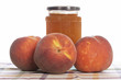 Peach jam and fruits on square mat. Shallow depth of field Peach jam and fruits on square mat. Shallow depth of field