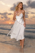 Woman on the beach during sunset