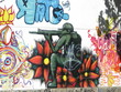Tireur à genoux dessiné sur un mur, Rio de Janeiro, Brésil. Tireur à genoux dessiné sur un mur, Rio de Janeiro, Brésil.