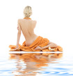 beautiful lady with orange towels on white sand
