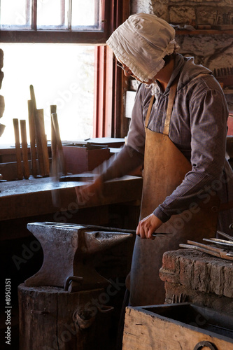 Photo: Woman Blacksmithing Woman Blacksmithing