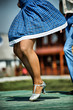 Country festival: girl dancing on the stage.