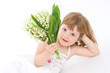 little, pretty girl holding bunch of lilies of the valley little, pretty girl holding bunch of lilies of the valley