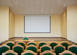 Modern auditorium hall for presentation with projection screen