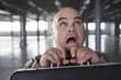 Foto: Businessman with shocked facial expressions. Businessman with shocked facial expressions.