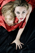 blonde girl with red silk that seeks the pleasure