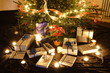 Christmas presents and candles under the tree Christmas presents and candles under the tree