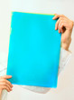 Women hands holding office folders