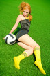 Beautyful fashion girl lie on the sport field