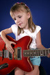 little girl with electric guitar