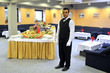 Young waiter in reataurant