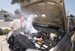 Photo: Man and overheated car Man and overheated car