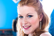 Close up of an attractive, blue eyed, blond woman