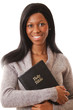 This is an image of a woman holding a bible. This is an image of a woman holding a bible.