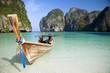 A longtail boat sits in Maya Bay, Koh Phi Phi Ley, Thailand