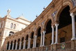 arches, columns, & sculptures of plaza de espana, seville