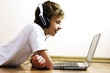 Boy spending time with notebook and modern technology Boy spending time with notebook and modern technology