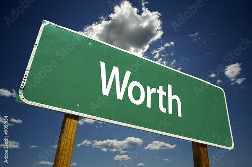 Photo: Worth Road Sign with dramatic clouds and sky. Worth Road Sign with dramatic clouds and sky.
