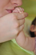 beautiful young mother hold small children hand