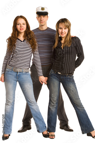 Photo: three young friends isolated on a white background three young friends isolated on a white background