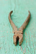 old iron rusty pliers with blured background old iron rusty pliers with blured background