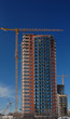 Crane and construction site. Crane and construction site.