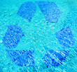 Recycling symbol in water